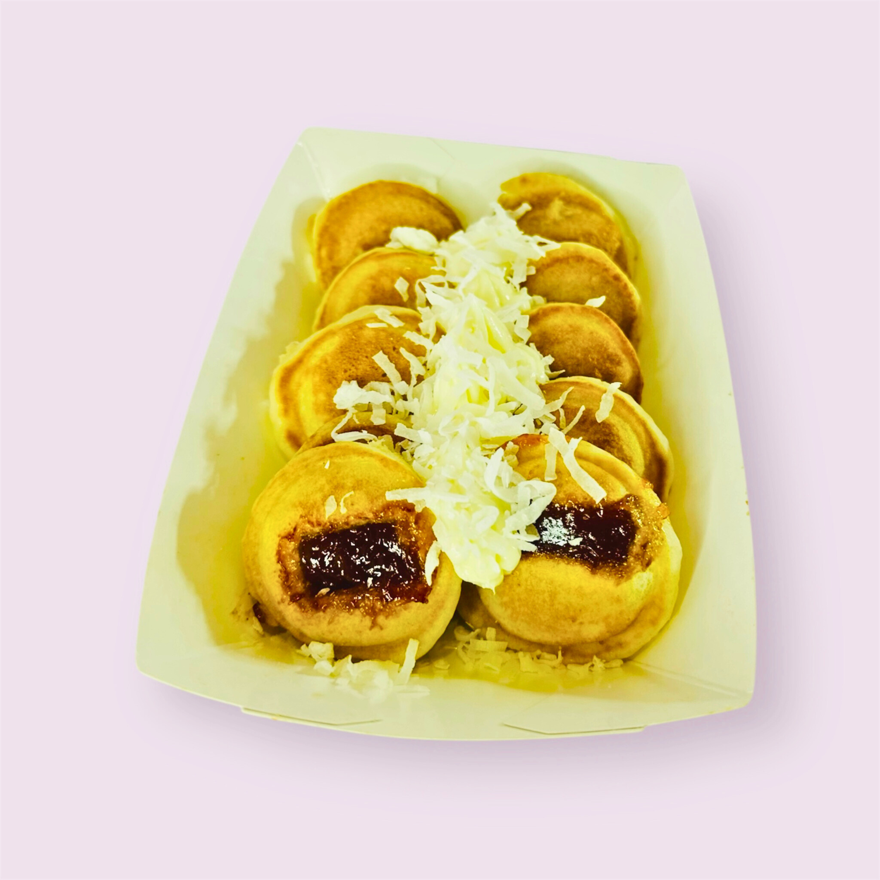 Mini pancakes with jam & shredded coconut